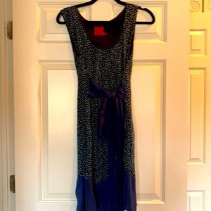 Bought from a boutique in Paris and never worn! Beautiful blue summer dress